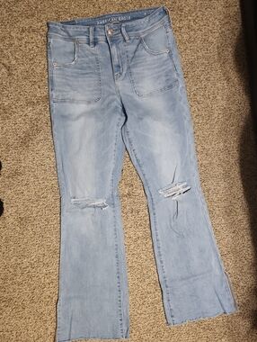 American Eagle Outfitters Light Blue Flare Jeans with Knee Rips 10 Short